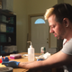 Biohacker Josiah Zayner in the midst of an experiment on himself. Image: Kristen V. Brown/Gizmodo
